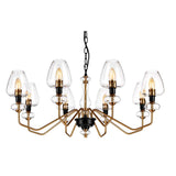 Introducing the Armand 8 Light Chandelier, a blend of aged brass and charcoal black paint. This elegant fixture features eight arms with clear glass shades and exposed bulbs, combining a contemporary design with gold-colored accents for a sophisticated look.