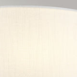 The Cooper Large Curved Wall Light in Polished Chrome features a textured, light beige fabric with subtle vertical lines that resemble a faux silk shade, giving the appearance of being illuminated from within. This fabric texture enhances depth and creates a gentle gradient effect, providing warm and soft ambient lighting.