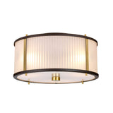 The Corona 3 Light Pendant / Semi-Flush - Bronze Dark Brown is a contemporary ceiling fixture with a cylindrical design, featuring a frosted glass shade and bronze dark brown accents. It is flush-mounted and casts a soft, warm glow.