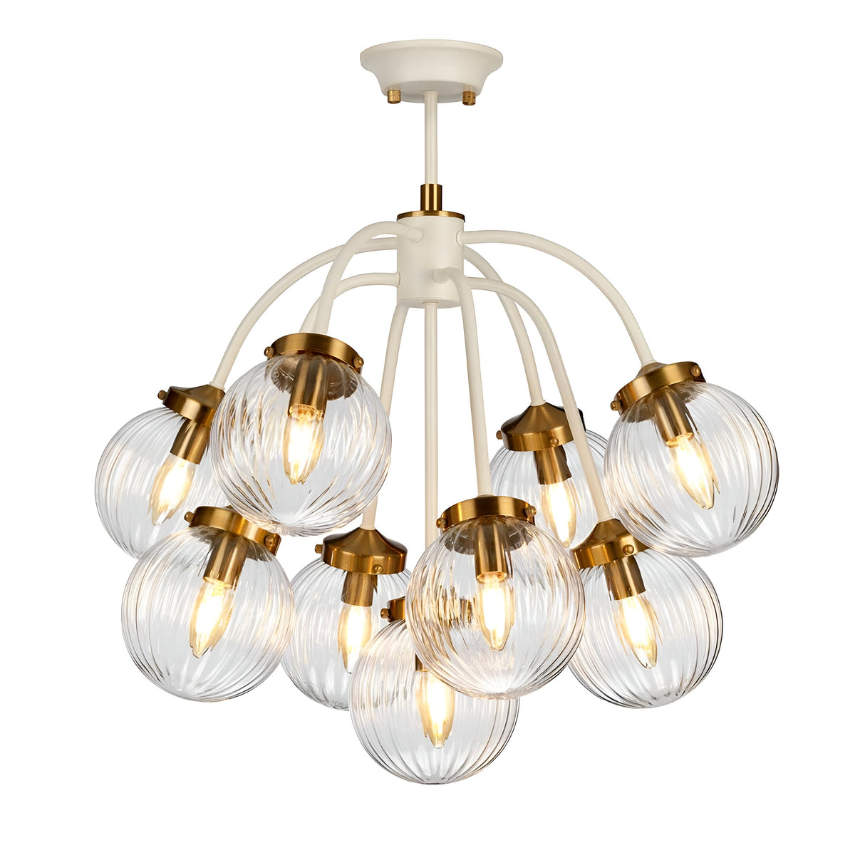 The Cosmos 9 Light Pendant combines a cream-painted metal structure with aged brass accents, showcasing a modern design. Its nine curved arms extend into hand-blown glass shades, each housing a glowing bulb, creating an elegant and stylish lighting fixture.