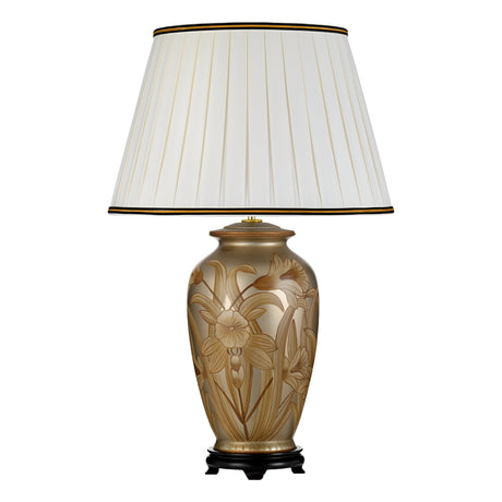 The Dian Table Lamp With Tall Empire Shade - Silver & Gold highlights a beige ceramic base adorned with an embossed floral design, evoking the style of an oriental ceramic vase. It is elegantly finished with a tall empire shade featuring white pleats and a delicate gold trim.