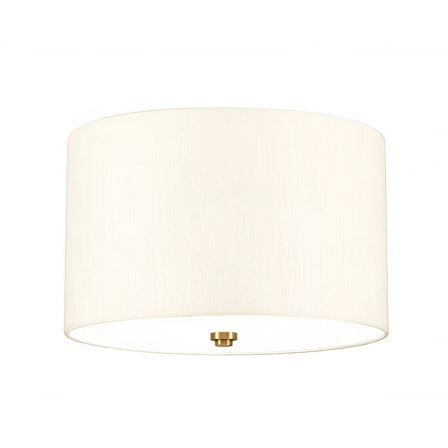 The Fletcher 14" Flush features a clean cylindrical design with an ivory faux silk shade and a small, round fixture finished in aged brass at the bottom center. The light is off, displayed against a white background which subtly highlights its flush mount design.