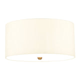 The Fletcher 18" Flush - Aged Brass With Ivory Shade boasts an elegant cylindrical design featuring a smooth faux silk shade and a central aged brass accent, making it an ideal choice for modern interiors.