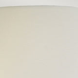 Close-up view of the plain, celadon empire shade from the Harbin Gourd Table Lamp, featuring a smooth texture against a light gray background. The image captures the curved edge and surface, emphasizing its simplicity and elegance.