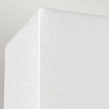 Close-up of the Riley Large Rectangular Wall Light in polished chrome against a light gray background. The sleek finish is visible, embodying the essence of contemporary design with its smooth and clean appearance.