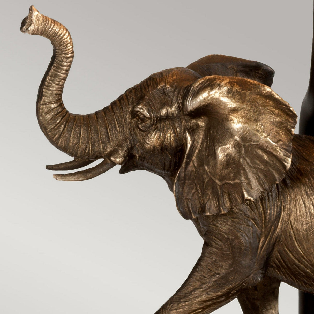 Here’s a refined version using the product data:

The Sabi Table Lamp with Oval Shade – Bronze Patina, showcases exquisite craftsmanship with its elegant bronze patina finish and lifelike design details. Set against a soft, neutral gray background, this piece exudes sophistication.