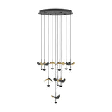 Dracera 10-Light Pendant in black with round steel canopy, ten cords holding curved black and gold leaf-shaped shades over small black dome lights, on white background.