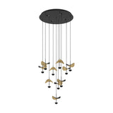 Dracera 10 Light Pendant in black, a round steel ceiling canopy with ten cascading drops holding curved leaf-shaped black and gold shades, shown on a plain white background.