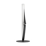 Drelvanne LED table lamp in black, side view showing the twisted figure-of-eight band with white LED strip, aluminium and steel body on a round black base, plain white background.