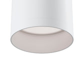 Close-up view of the Focus Fixed Round Surface Mounted Downlight - White, featuring a modern cylindrical design with a smooth finish. This minimalistic fixture is turned off against a plain white background, ideal for ambient lighting.