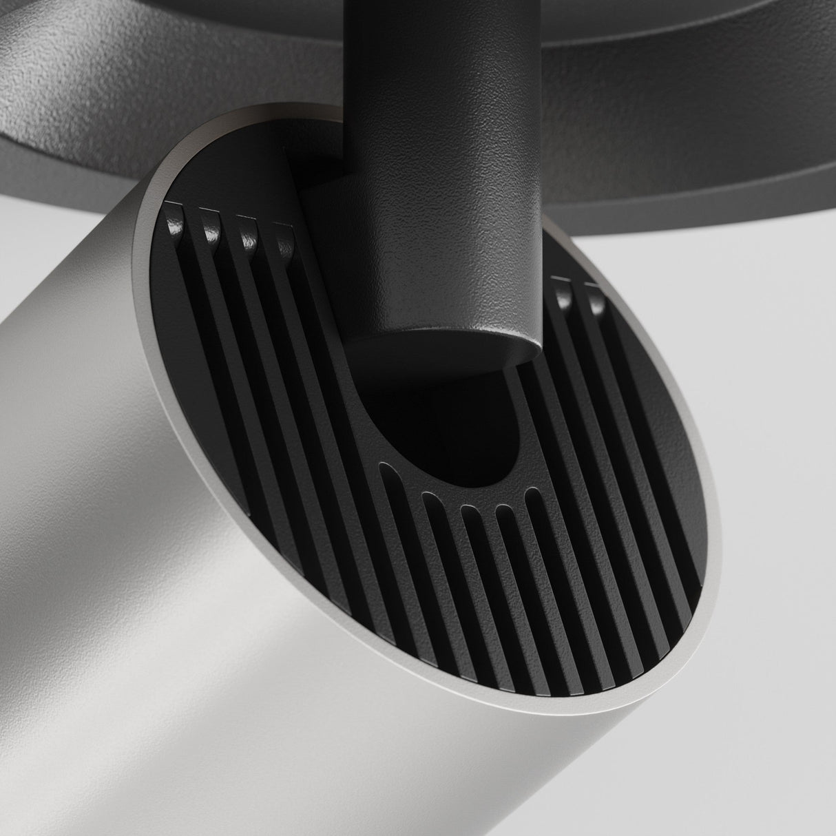 Close-up of FOCUS S Single Recessed Spotlight in black and matte silver, highlighting its sleek recessed profile