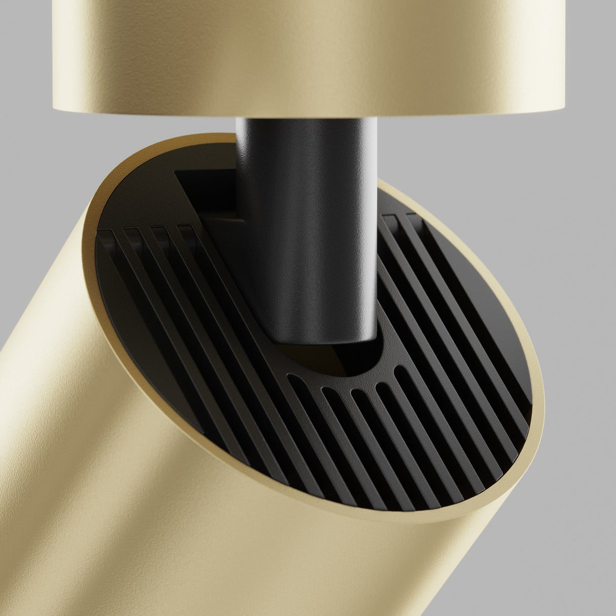 Close-up of Focus S Long Single Surface-Mounted Spotlight in gold, showcasing its polished gold finish