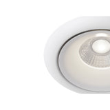 The Yin LED Round Recessed Downlight 9W 3000K - White features a frosted lens and metallic accents. It is dimmable and emits a soft glow against a white background.