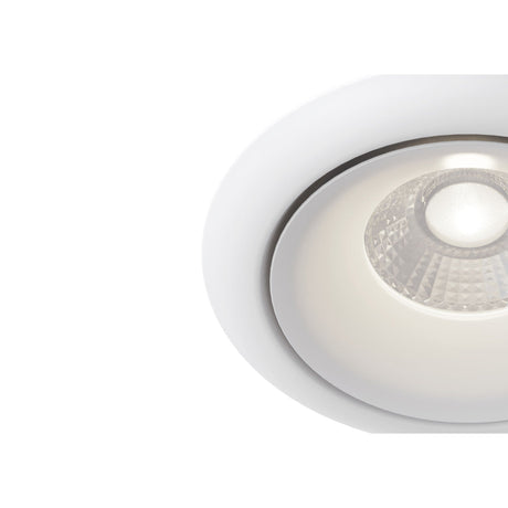 The Yin LED Round Recessed Downlight 9W 3000K - White features a frosted lens and metallic accents. It is dimmable and emits a soft glow against a white background.