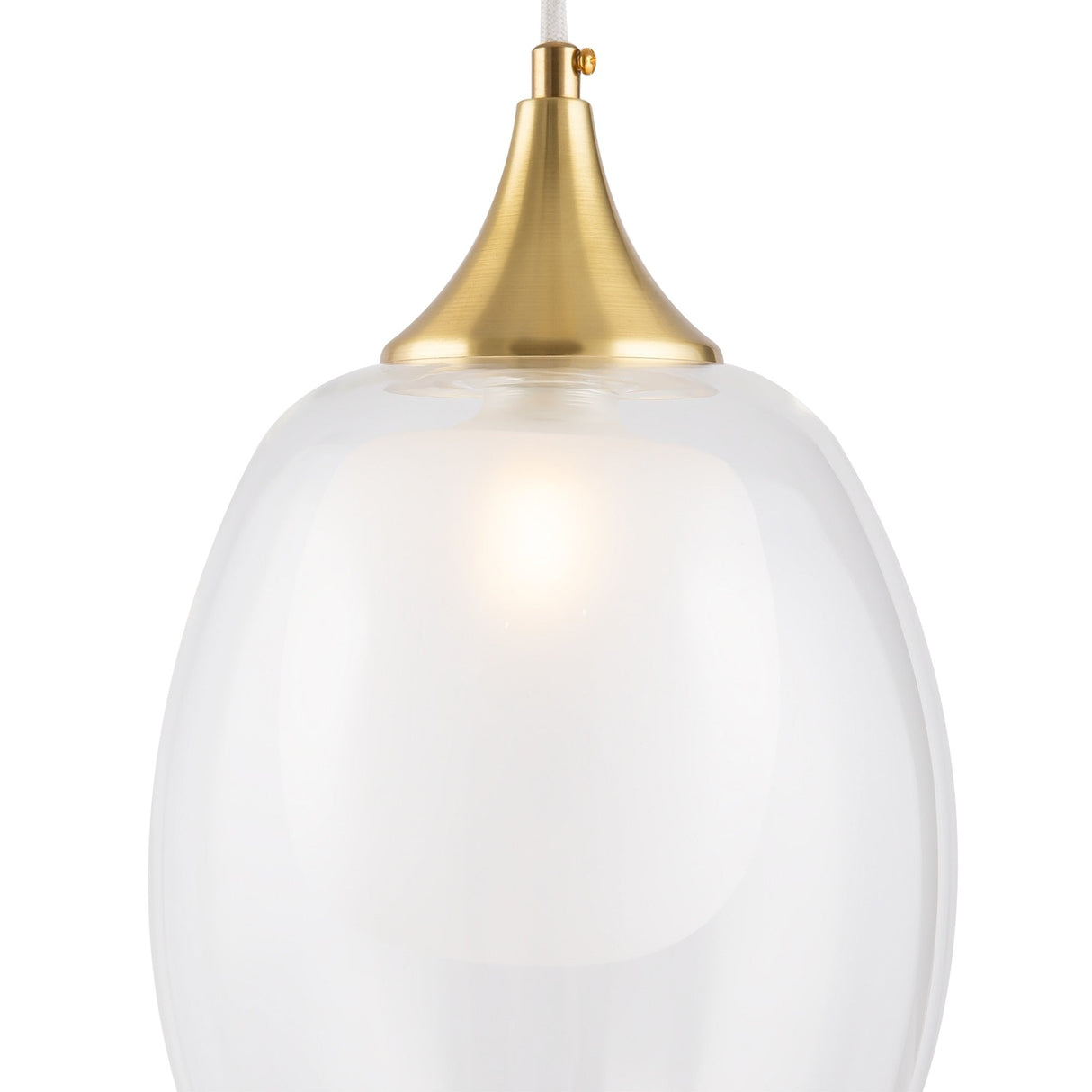 The Aura Pendant Light - Brass With Inner Frosted & Outer Clear Glass Shade displays modern style with its oval glass shade and a brushed brass cone top emitting a soft glow, enhancing the sleek brass frame.