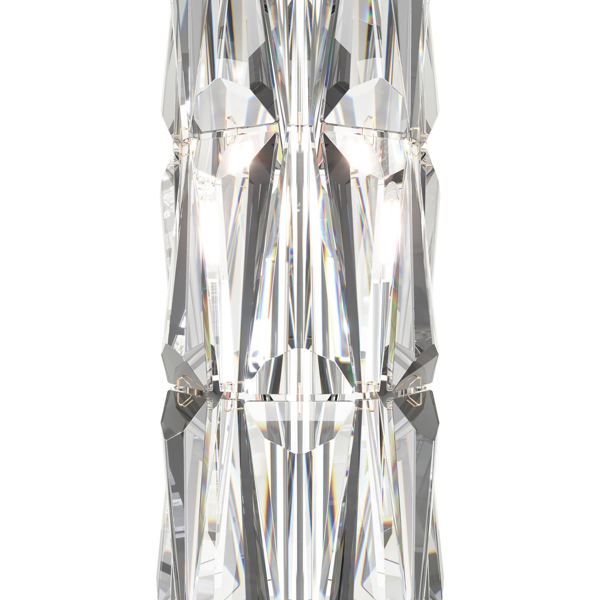 A close-up of the Puntes Table Lamp - Gold With Crystal reveals intricately faceted glass that reflects light, creating a symmetrical, kaleidoscopic effect. This luxurious lamp elegantly complements the vertically aligned crystal accents in the image.