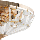 Close-up of the Facet 6 Light Flush, showcasing a luxurious design with a gold frame and clear geometric crystal accents. This elegant and modern chandelier beautifully reflects light, emphasizing its intricate crystal details.
