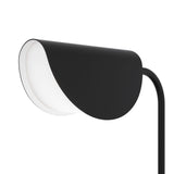 A close-up of the Mollis Table Lamp - Black highlights its minimalist curved design; the black metal base adds to its sleekness, while the partially revealed LED light source and plain white background enhance its contemporary elegance.