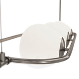 The Erich 3 Light Suspension - Nickel With White Glass showcases a sleek metal frame in a Nickel finish and three white globes, offering a modern minimalistic ceiling design.