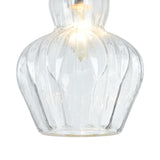 The Eustoma Pendant Light - Nickel With Transparent Glass showcases a clear glass with a wavy texture. Its rounded, vase-like shape houses a warm bulb for an ambient glow, and its elegant look is enhanced by the nickel finish.