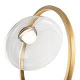 The Lunare LED Downward Wall Light 5W 3000K in brass with clear glass features a sleek globe encircled by a warm brass arc, emitting a soft glow for modern elegance.