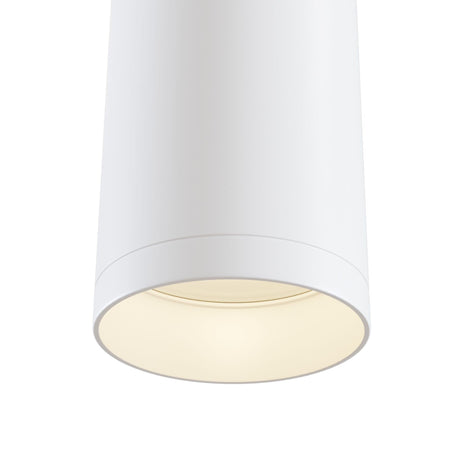 Close-up of the Single Phase UNITY Track Pendant Light in white, featuring a sleek cylindrical design with a smooth matte finish and a glowing GU10 bulb—an ideal example of modern lighting style.