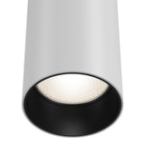 Close-up of the Focus Single phase UNITY Track Pendant Light in white. The pendant emits a bright glow with its adjustable cable. Its black interior contrasts with the outer surface, enhancing its modern industrial look, viewed from below.