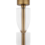 Close-up of the Prima Table Lamp - Brass With White Shade, highlighting its modern Bauhaus design with a brass frame and sleek, overlapping cylindrical elements for a sophisticated layered effect.