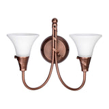 The Emily 2 Light Wall Light - Copper Patina exudes elegance with its bronze finish and frosted glass cone-shaped lampshades. It features a circular base with a copper patina, and two curved arms extend outward symmetrically to hold the shades.