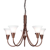 The Emily 5 Light Chandelier - Copper Patina features a stunning copper patina finish with five frosted glass lampshades, gracefully curved arms, and an ornate central column. Suspended from a short chain, it exudes vintage appeal and classic elegance, making it an ideal lighting fixture for any room.