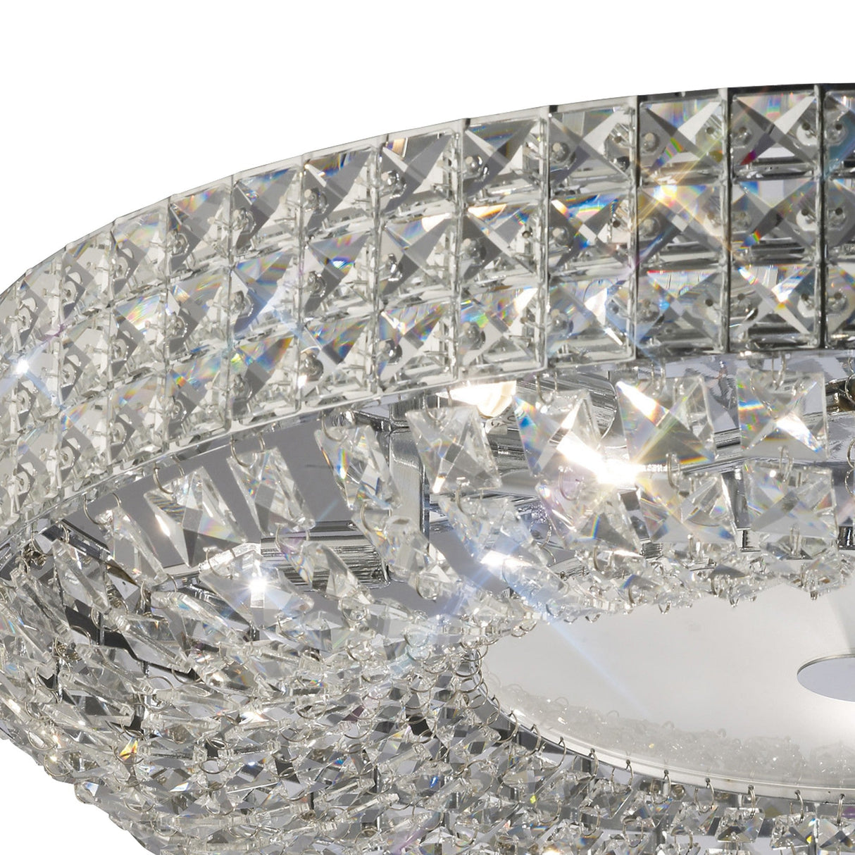 Close-up of Diyas Enya 9 Light crystal flush ceiling light showing stacked square-cut crystal bands on a polished chrome frame with frosted diffuser.