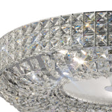 Close-up of Diyas Enya 9 Light crystal flush ceiling light showing stacked square-cut crystal bands on a polished chrome frame with frosted diffuser.