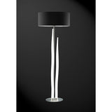 The Estalacta 3 Light Floor Lamp features a sleek silver base, black drum shade, and artistic white wavy supports—a striking statement piece that adds modern flair to any room.