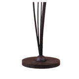 A close-up of the Estilo 2 Light Floor Lamp in Brown & Black Oxide shows its dark metal base with slim vertical rods rising from a round, flat platform against a plain white background.