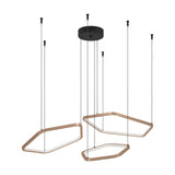 Estrella Pendant Light, 96 x 52cm, featuring three bronze hexagonal rings at varying heights on black cables from a black canopy, each with a white LED diffuser.