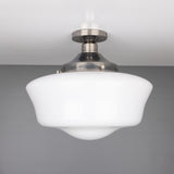 Ethrina Glass Semi Flush Ceiling Light with white opal schoolhouse-style glass shade on a short stem from a round antique silver ceiling plate, shown against a plain grey background.