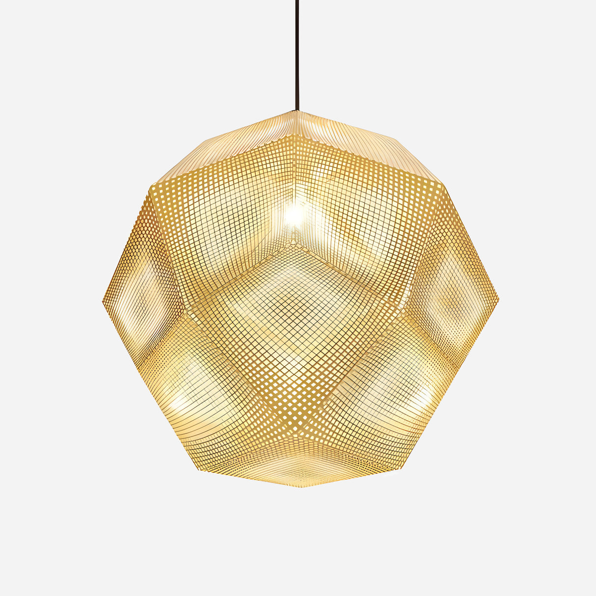 The Rango Large Pendant Light - Gold showcases a geometric design crafted from perforated metal that casts a warm glow. This elegant fixture creates intricate patterns of light and shadow and hangs by a slender black cord, contrasting beautifully against a simple white backdrop.