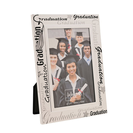 Graduation Satin Photo Frame, 6 x 4in, silver finish with black and grey "Graduation" text, stars and tassel detail, holding a graduation group photo on a white background.