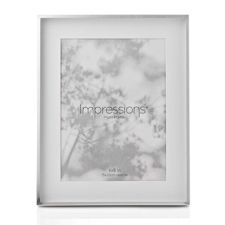 Silver shadow photo frame with white mount, slim rectangular border for an 8 x 6in print, shown upright on a plain white background.