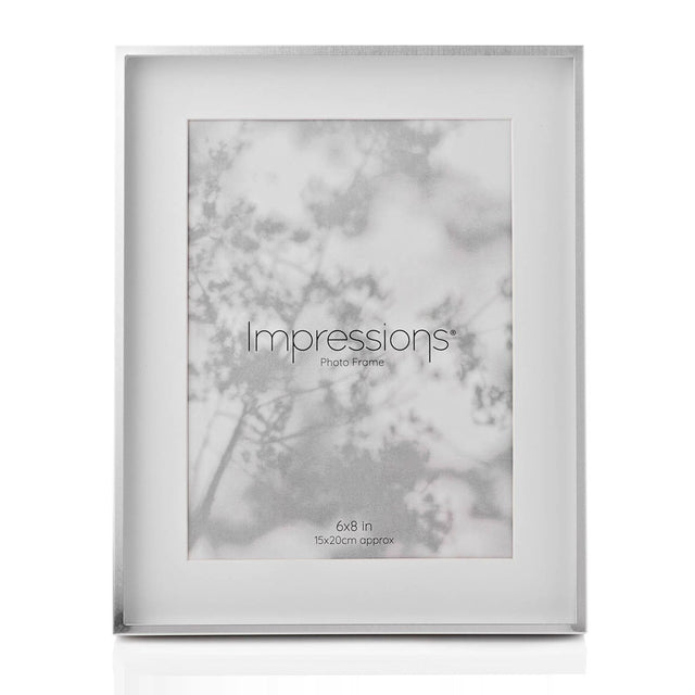 Silver shadow photo frame with white mount, slim rectangular border for an 8 x 6in print, shown upright on a plain white background.