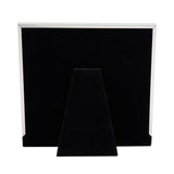 Square aluminium photo frame, 6 x 4in, in satin silver with embossed Graduation text, shown from behind with black velvet backing and easel stand on a white background.