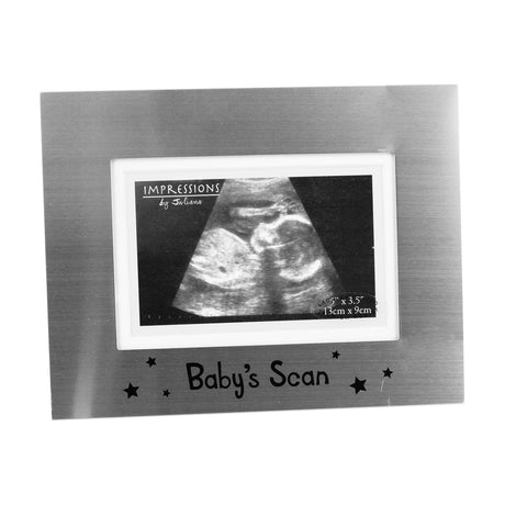 Rectangular satin aluminium photo frame in silver with a white border, "Baby's Scan" text and star details beneath the opening, shown with a sample ultrasound photo on a white background.