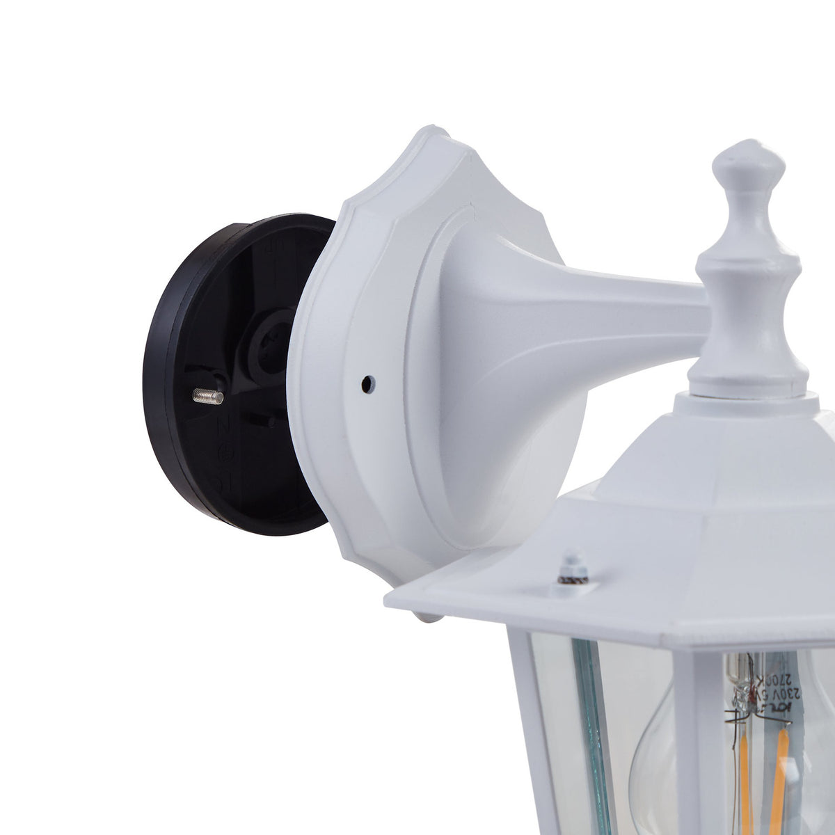 Close-up of the Fasvette outdoor wall light's black wall mounting bracket and white cast aluminium arm with turned finial, set against a plain white background.