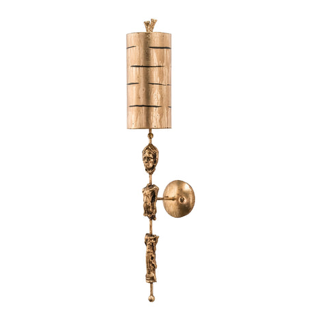 The Fragment 1 Light Wall Light in Aged Gold captures a blend of modernity and vintage charm with its ornate, elongated vertical design. It features a cylindrical lampshade at the top, detailed sculptural elements below, and a round mounting plate on the side, all highlighted by its aged gold finish.