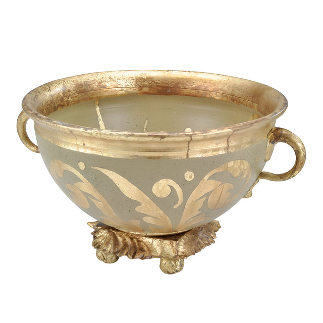 The Rocheblave Decorative Bowl showcases an exquisite antiqued gold leaf pattern and a luxurious gold rim. Complete with two handles, it rests gracefully on a floral-shaped gold stand, enhancing any interior decor with its elegant, vintage charm.