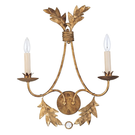 Introducing the Sweet Olive 2 Light Wall Light - Gilded Gold, a vintage-style sconce featuring two candle-shaped lights with a sophisticated gilded gold finish. Its elegant design includes intricate leaf details and a crystal medallion, infusing classical charm into any space.