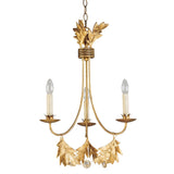 The Sweet Olive 3 Light Chandelier in Gilded Gold exudes elegance with its gold finish, three-arm design, and leaf-like decorative elements. This chandelier, hanging from a chain, radiates a vintage aesthetic with candle-style lights and is elegantly enhanced by gilded gold touches and a crystal medallion, perfectly blending sophistication with natural motifs.