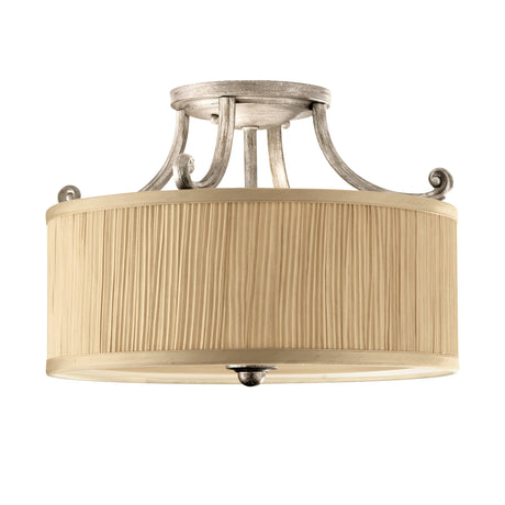 Introducing the Abbey 3 Light Semi Flush - Silver Sand, a fixture with a metallic frame embellished with decorative scroll details. Its timeless elegance is highlighted by beige pleated shades, making it an ideal choice for adding sophistication to any room with its semi-flush mount design.