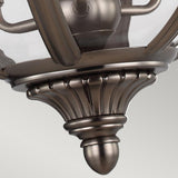 Close-up of the Adams 3 Light Chandelier in Antique Nickel, featuring an ornate, brushed metal design with a fluted look and clear glass panels. This fixture exudes classic craftsmanship and elegance with its smooth, curved detailing reminiscent of Victorian-inspired lighting.