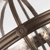 Detailed view of the Adams 4 Light Chandelier in British Bronze, featuring a rustic finish and intricate detailing. The Victorian Era design includes multiple curved arms and candle-style bulbs encased in glass covers, providing an elegant and warm ambiance.